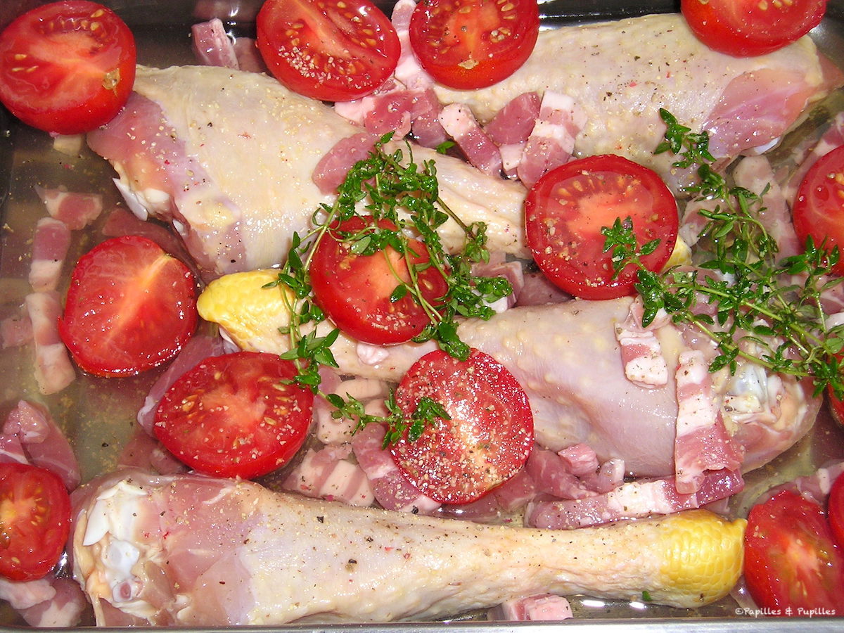 Cuisses de poulet au thym et à la tomate au four avant cuisson