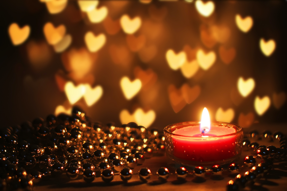 St Valentine's day greeting card with candle and hearts