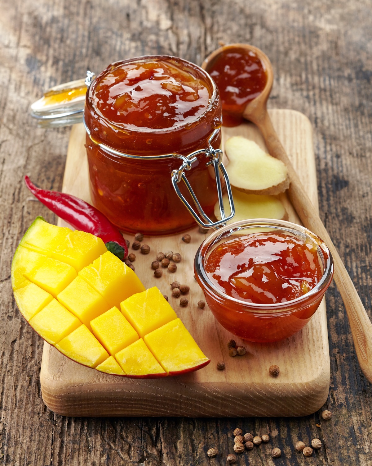 Jar of Mango Chutney on old wooden table