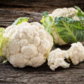Organic cauliflower on wooden backgroundOrganic cauliflower on wooden background