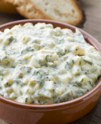 Dish of Sauce Gribiche with Toasted Baguette