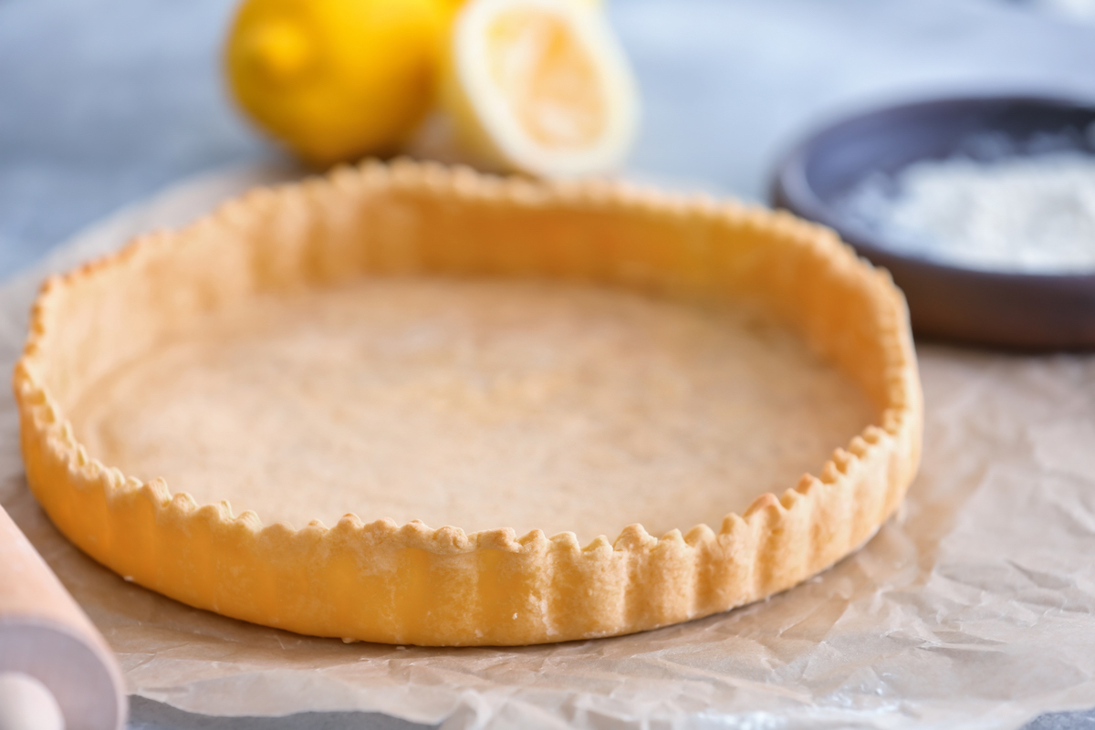 Pâte à tarte cuite à blanc ©Africa Studio shutterstock