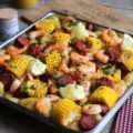 Gambas, pommes de terre, chorizo et maïs au four