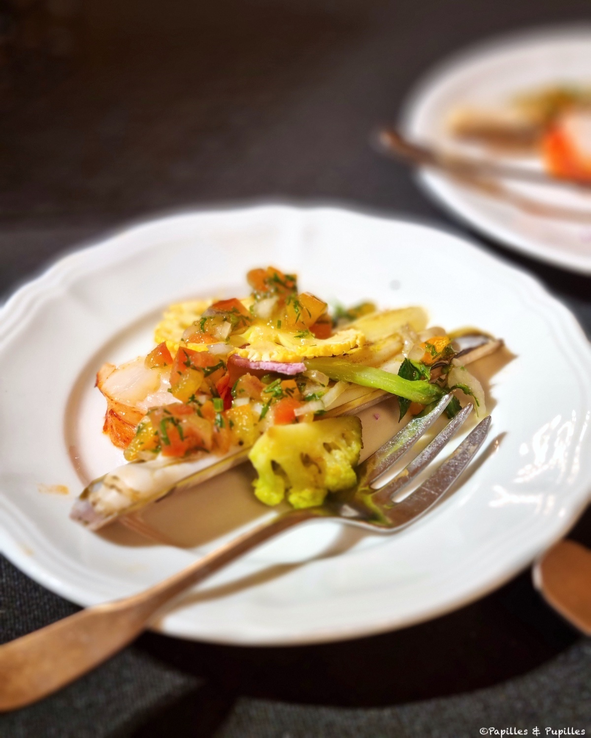 Homard, couteau et chou fleur