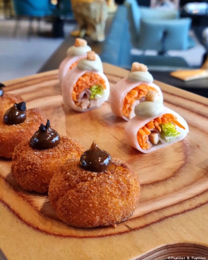 Croquette de morue à l'ail noir et rouleau de printemps façon Caesar