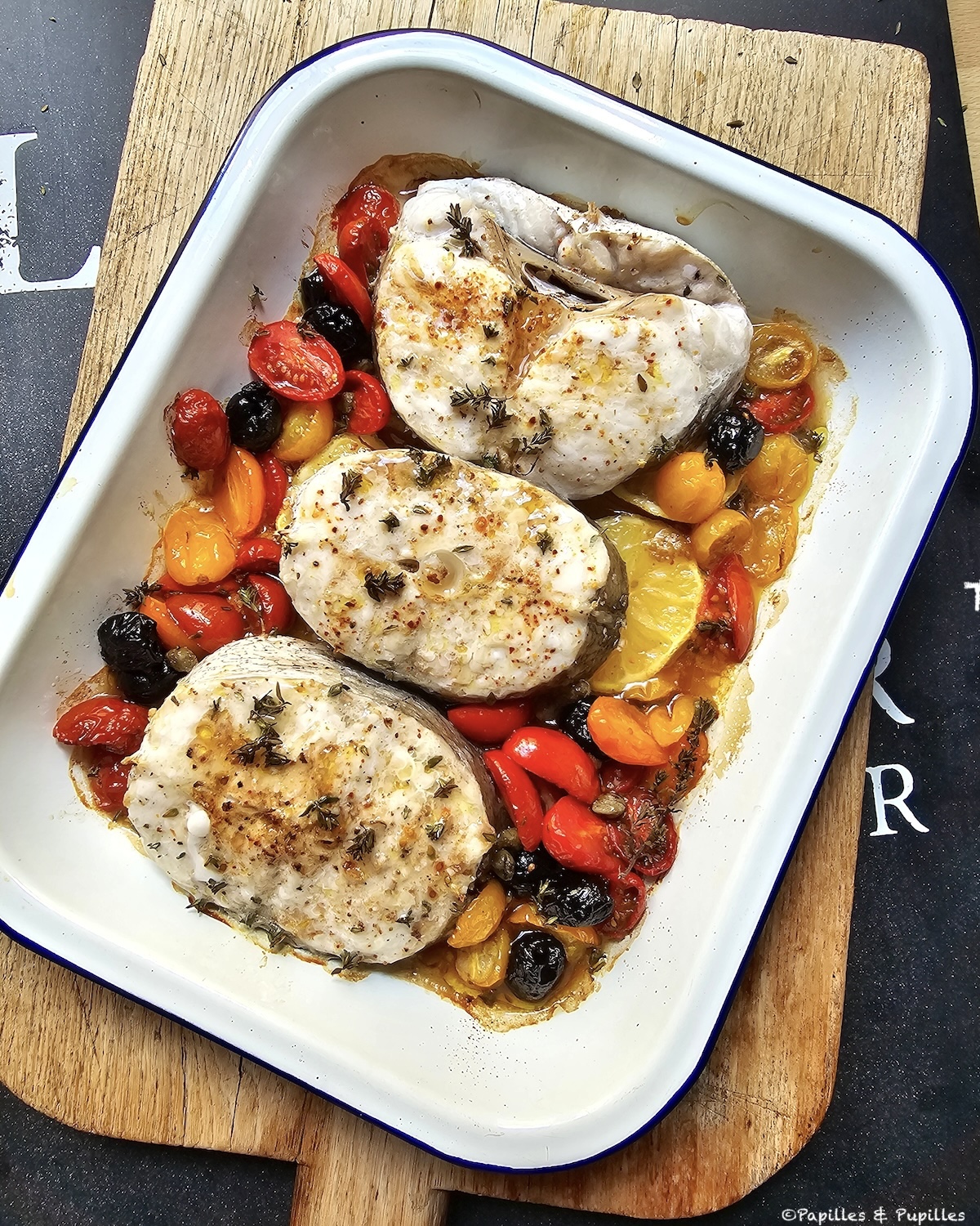 Darnes de merlu au four à la Méditerranéenne