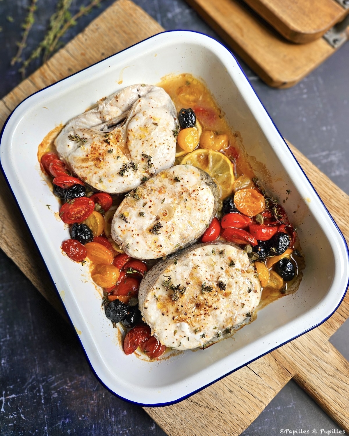 Darnes de merlu au four à la Méditerranéenne