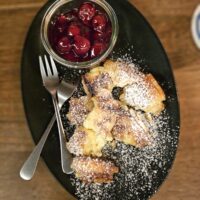 Kaiserschmarrn with warm sour cherries