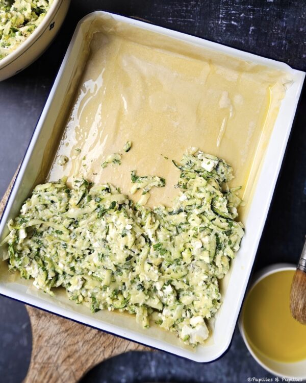 Commencez la couche de courgettes