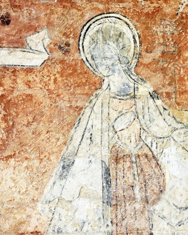 Peinture murale ancienne dans le cloître de Cadouin représentant un personnage religieux